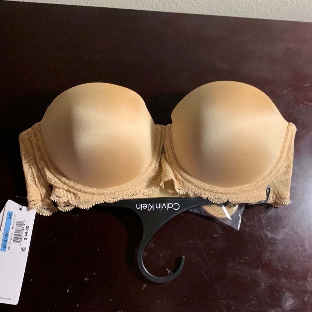 New with tags 34C and 38C Calvin Klein tan lace strapless bra